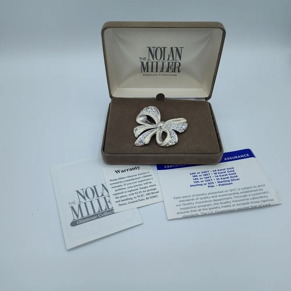 Vintage NIB Nolan Miller Silver-tone Bow Brooch With Rhinestones